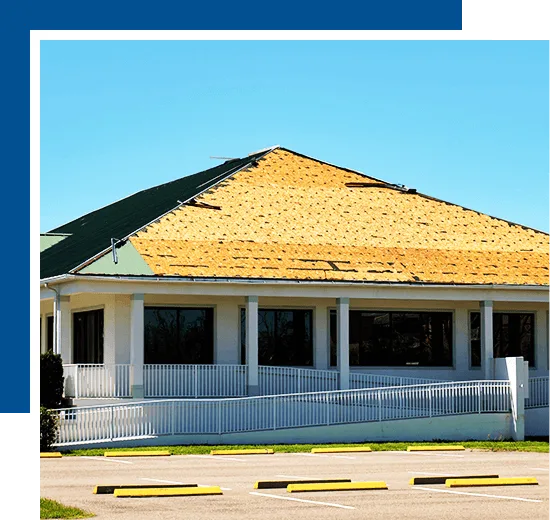 Wind damaged house roof with missing asphalt shingles after hurricane Ian in Florida. Repair of home rooftop concept